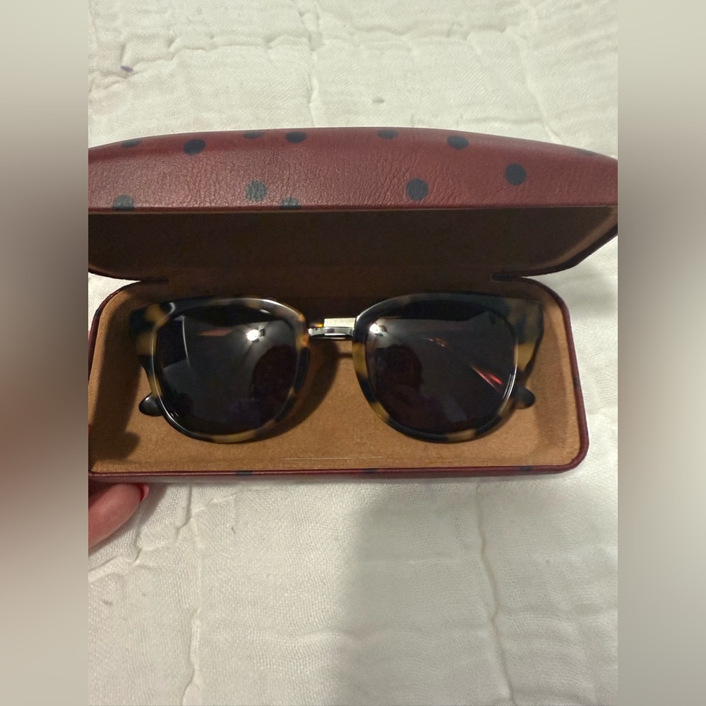 Madewell tortoise sunglasses and case.